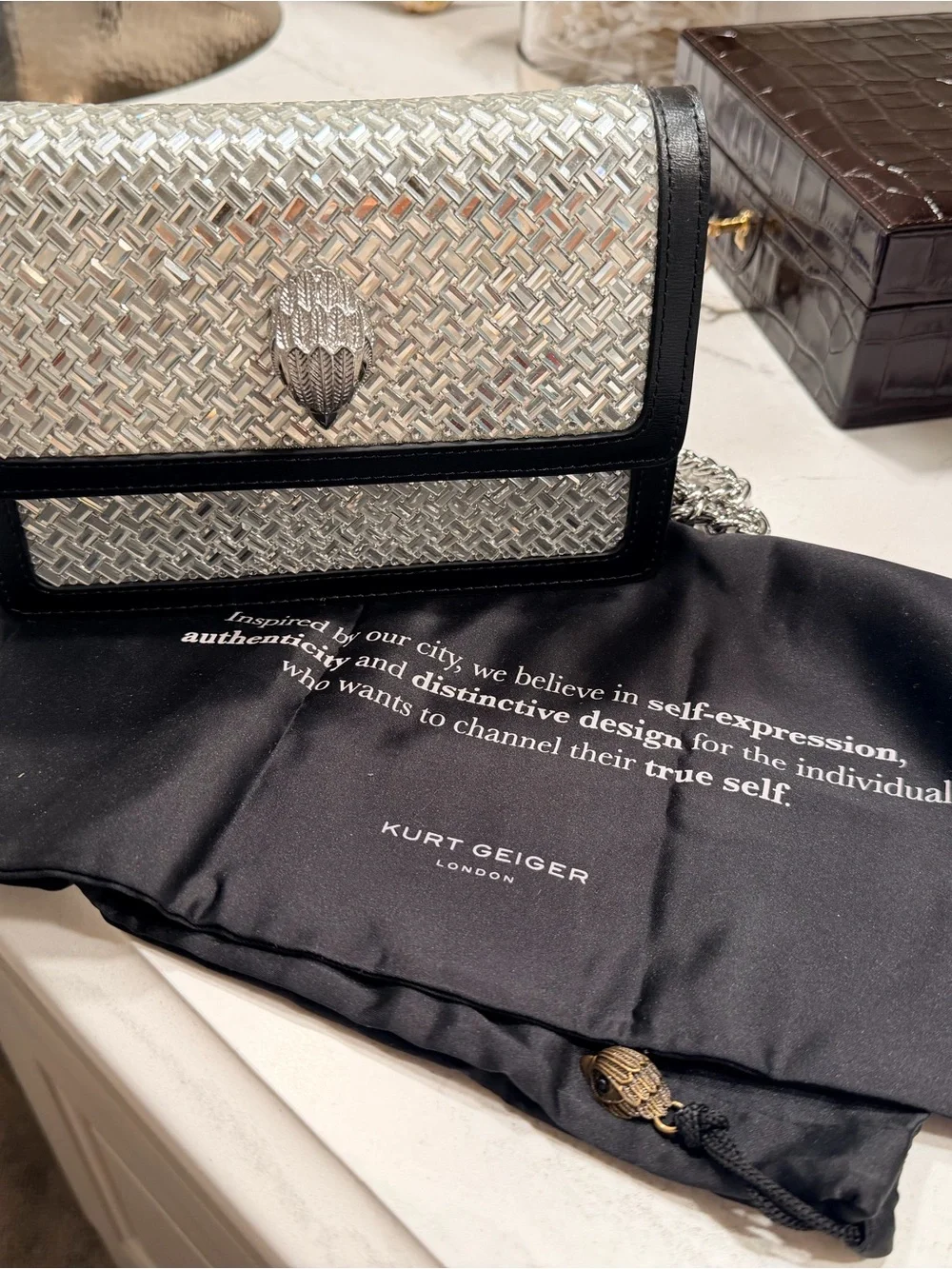 Kurt Geiger Silver Mirror Woven Crossbody with Black Trim and Silver Chain Strap